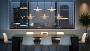 Ludo 5 Light 51.5" Linear Pendant in Matte White + Modern Gold in a room setting