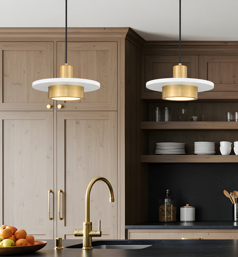 Ludo 1 Light 12" Pendant in Matte White + Modern Gold in a room setting