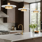 Ludo 1 Light 16" Pendant in Matte White + Modern Gold in a room setting