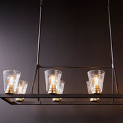 Paxton 8 Light Linear Chandelier in Textured Black / Aged Brass