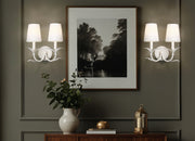 Aslin 2 Light 11.75" Wall Sconce in Textured White in a room setting