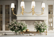 Aslin 6 Light 44" Linear Pendant in Gold Leaf in a room setting