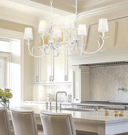 Aslin 6 Light 44" Linear Pendant in Textured White in a room setting