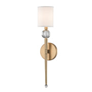 Rockland Bath Sconce in Aged Brass