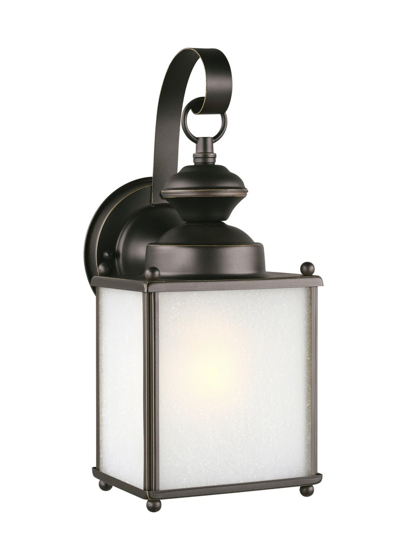 Jamestowne Medium Frosted Seeded Outdoor Wall Lantern in Antique Bronze