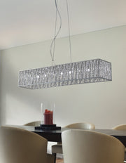Terra 9 Light 46" Linear Pendant in Chrome in a room setting