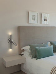 Forest 3 Light 4.75" Wall Sconce in Brushed Nickel in a room setting