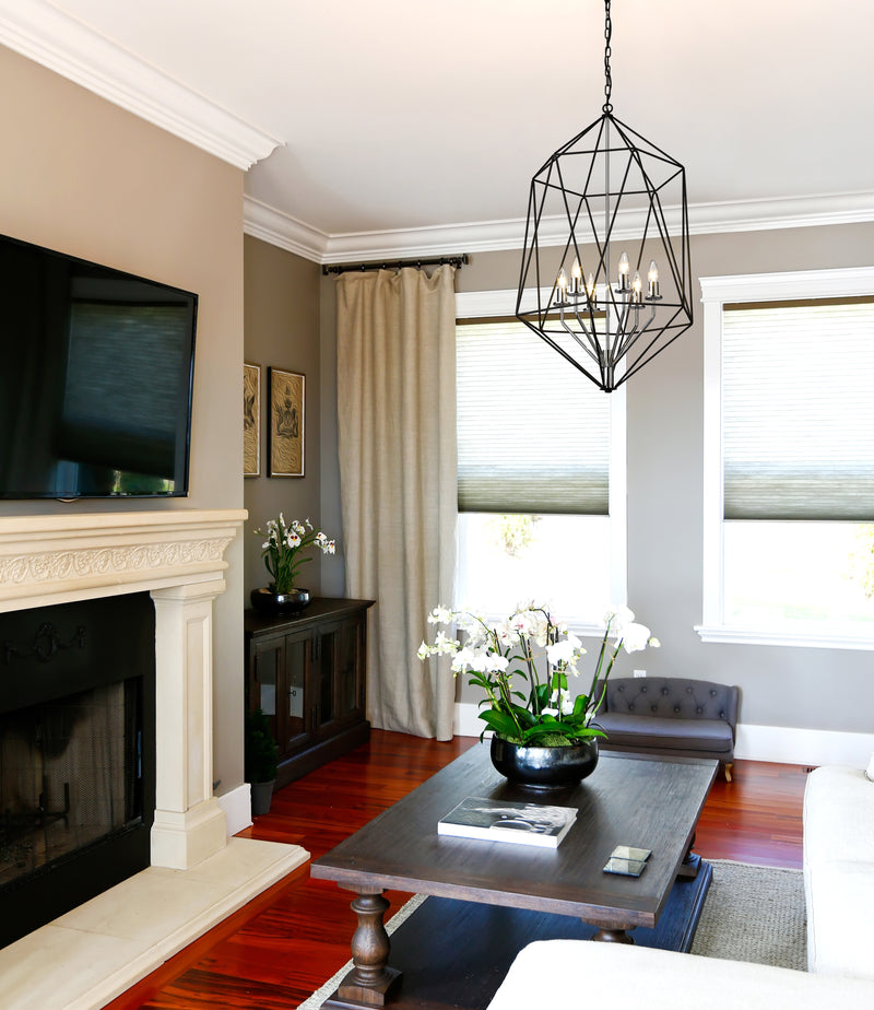 Geo 6 Light 21.5" Chandelier in Matte Black + Chrome in a room setting
