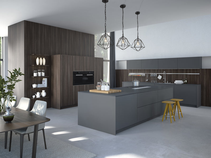 Geo 1 Light 11.75" Pendant in Matte Black + Chrome in a room setting