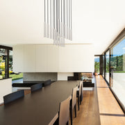 Forest 17 Light 42" Linear Pendant, 12" Tall in Brushed Nickel in a room setting