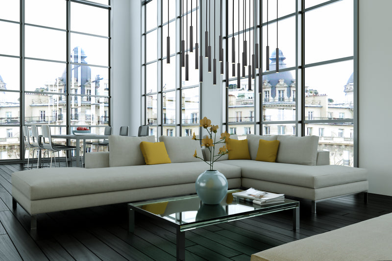 Forest 23 Light 54" Linear Pendant, 12" Tall in Matte Black in a room setting
