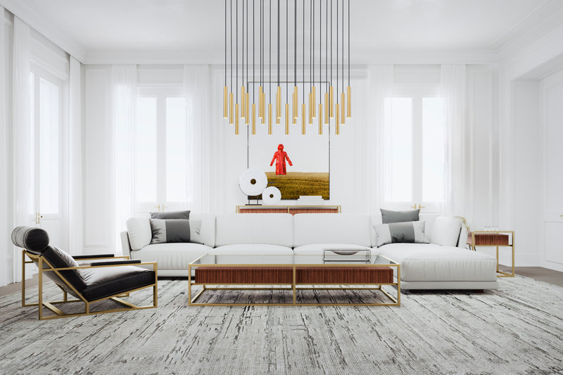 Forest 23 Light 54" Linear Pendant, 12" Tall in Modern Gold in a room setting