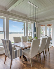 Forest 5 Light 42" Linear Pendant, 12" Tall in Brushed Nickel in a room setting