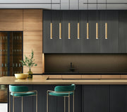 Forest 7 Light 54" Linear Pendant, 12" Tall in Modern Gold in a room setting