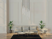 Forest 11 Light 24" Pendant, 23.75" Tall in Brushed Nickel in a room setting
