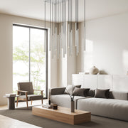 Forest 17 Light 42" Linear Pendant, 23.75" Tall in Brushed Nickel in a room setting