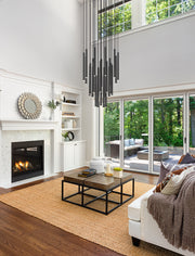 Forest 27 Light 36" Pendant, 23.75" Tall in Matte Black in a room setting