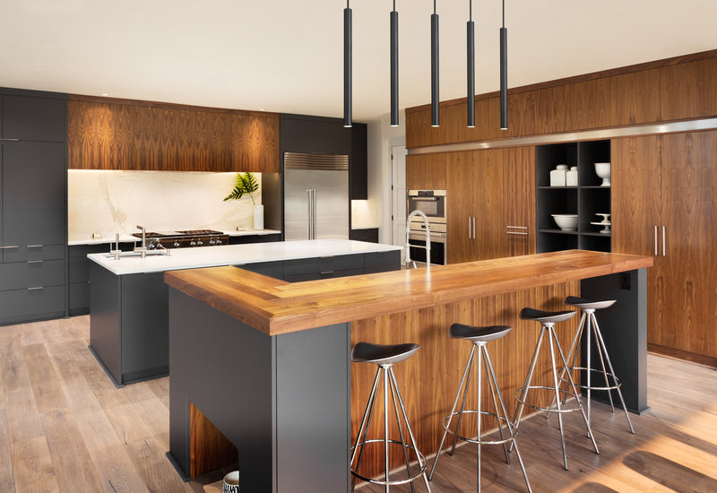 Forest 5 Light 42" Linear Pendant, 23.75" Tall in Matte Black in a room setting