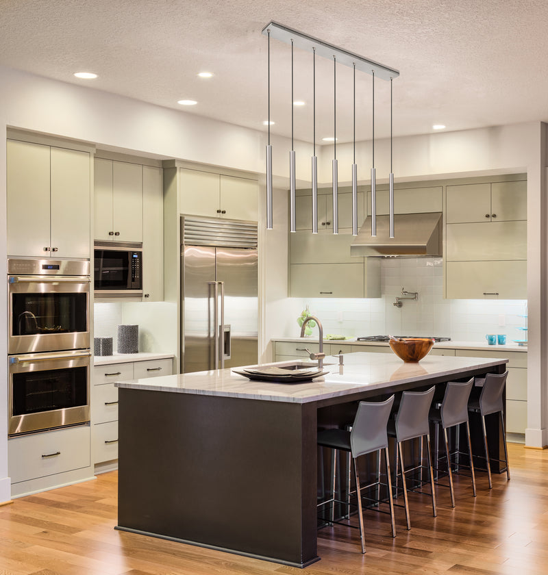 Forest 7 Light 54" Linear Pendant, 23.75" Tall in Brushed Nickel in a room setting