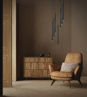 Forest 7 Light 18" Pendant, 23.75" Tall in Matte Black in a room setting
