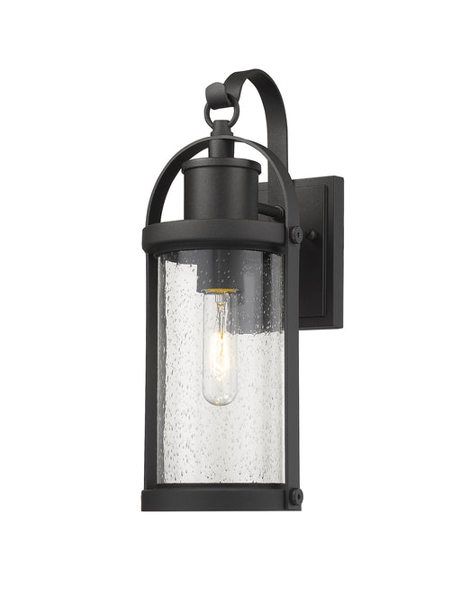 Roundhouse 1 Light Outdoor Wall Sconce in Black with Clear Seedy Glass