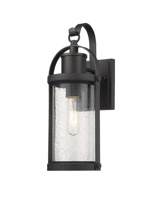 Roundhouse 1 Light Outdoor Wall Sconce in Black with Clear Seedy Glass