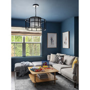 Hulton 5 Light 25" Pendant in Matte Black in a room setting
