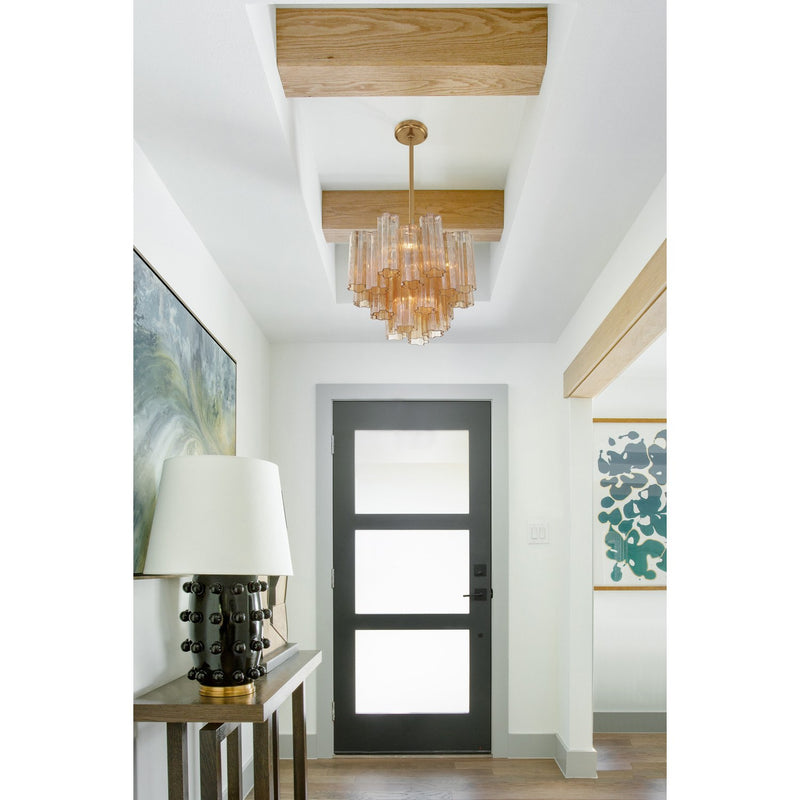 Addis 4 Light 17.75" Pendant in Aged Brass in a room setting