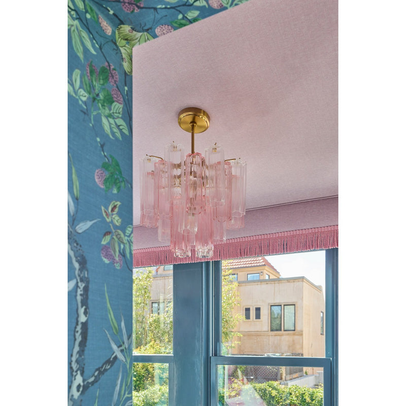 Addis 4 Light 17.75" Pendant in Aged Brass in a room setting