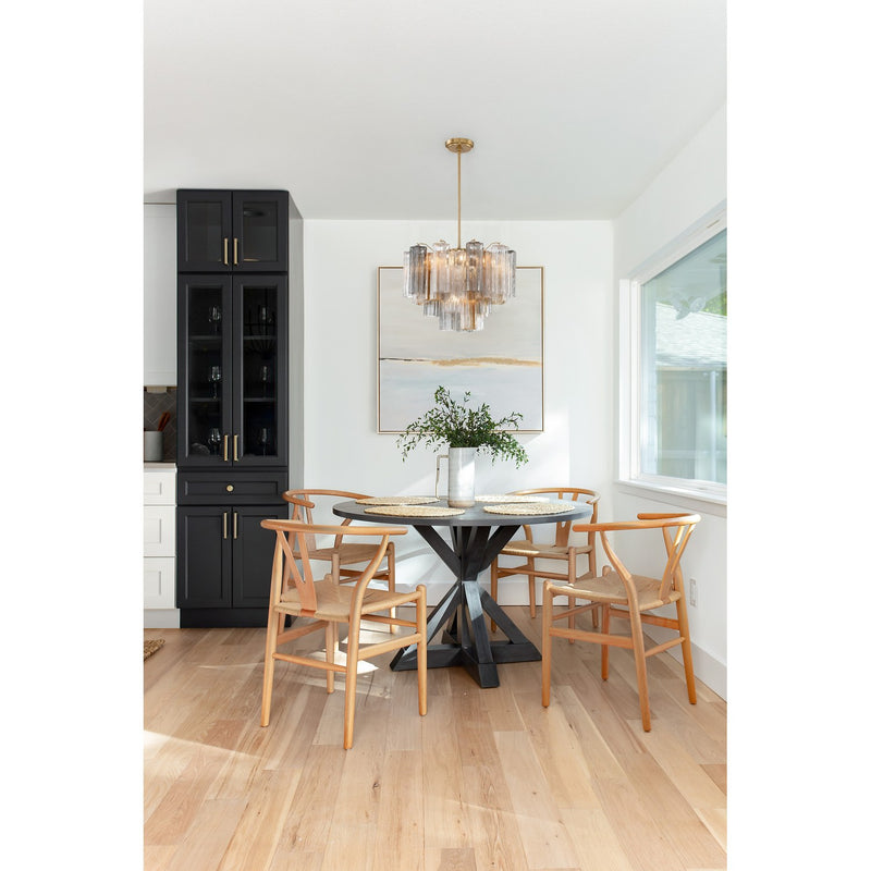 Addis 6 Light 19.75" Chandelier in Aged Brass in a room setting
