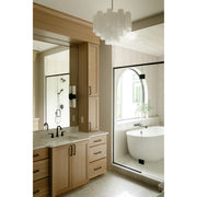 Addis 6 Light 19.75" Chandelier in Aged Brass in a room setting