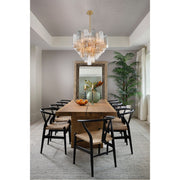Addis 12 Light 26.75" Pendant in Aged Brass in a room setting
