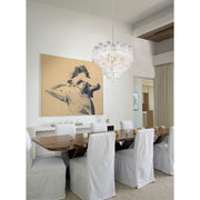 Addis 12 Light 26.75" Pendant in Polished Chrome in a room setting
