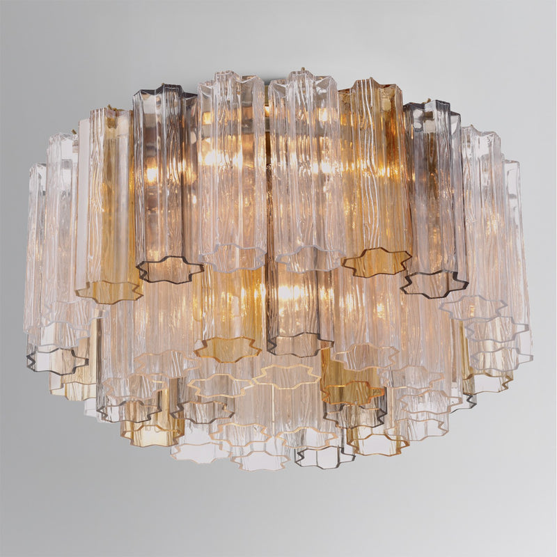 Addis 6 Light 22.25" Flush Mount in Aged Brass in a room setting