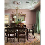 Arcadia 8 Light 26.75" Chandelier in Antique Gold in a room setting
