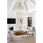Arcadia 12 Light 32.5" Chandelier in Antique Gold in a room setting