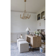 Bailey 8 Light 28" Chandelier in Aged Brass in a room setting