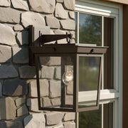 Belmont 1 Light 9.5" Outdoor Sconce in Twilight Bronze in a room setting