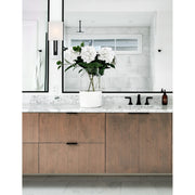 Brent 1 Light 6.5" Sconce in Polished Nickel + Black Forged in a room setting