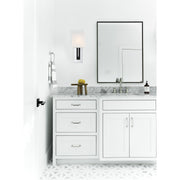 Brent 1 Light 6.5" Sconce in Polished Nickel + Black Forged in a room setting