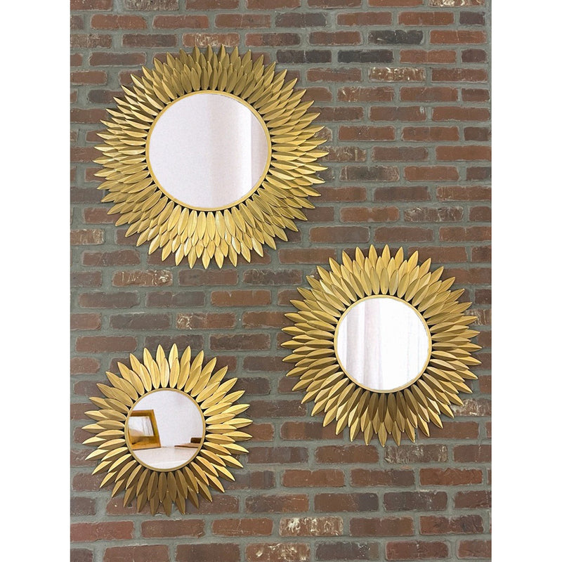 Broche 24" Mirror in Antique Gold in a room setting