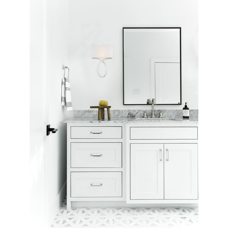 Brinkley 2 Light 10" Sconce in Polished Nickel in a room setting