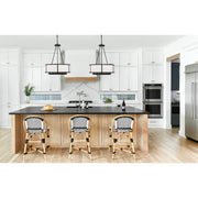 Bryant 6 Light 24" Chandelier in Black Forged in a room setting