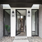 Byron 3 Light 7.5" Outdoor Sconce in Matte Black in a room setting