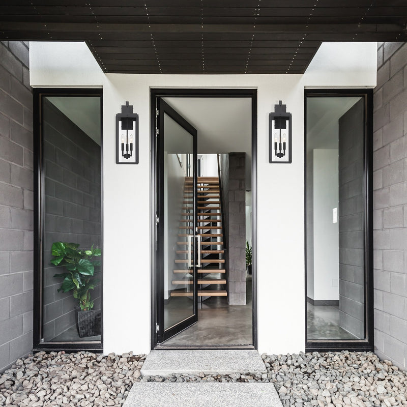 Byron 3 Light 7.5" Outdoor Sconce in Matte Black in a room setting