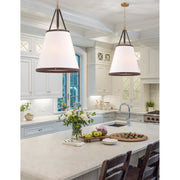 Callahan 6 Light 21" Pendant in Luxe Gold in a room setting
