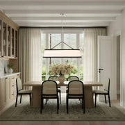 Callahan 6 Light 47.5" Linear Oval Pendant in Polished Nickel in a room setting