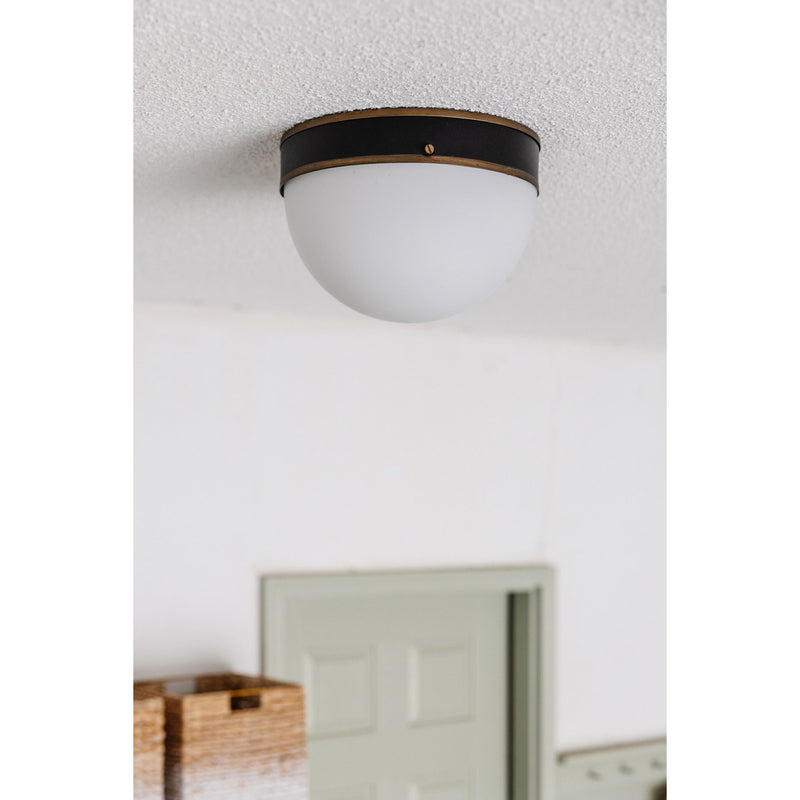 Capsule 2 Light 12" Outdoor Flush Mount in Matte Black + Textured Gold in a room setting