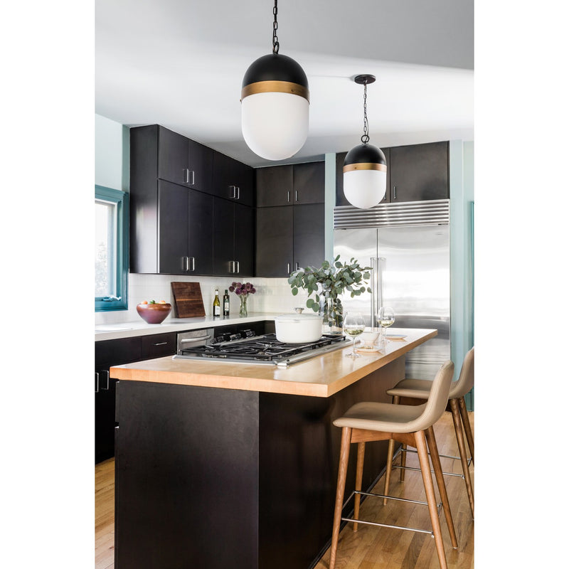 Capsule 1 Light 8" Outdoor Pendant in Matte Black + Textured Gold in a room setting
