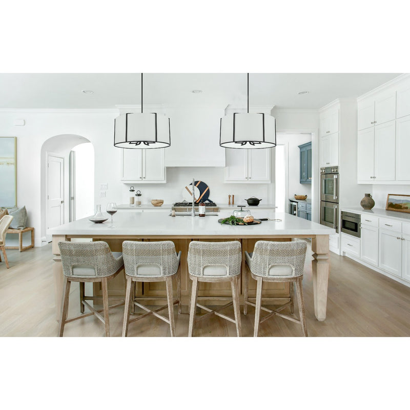 Carlyn 6 Light 24" Pendant in Black in a room setting